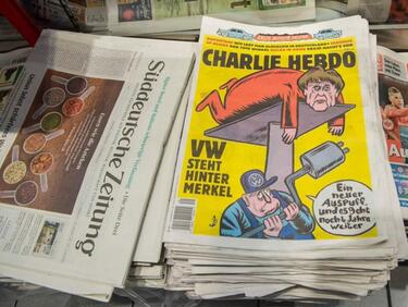 „Шарли Ебдо” не пожали Меркел още в първия си немски брой