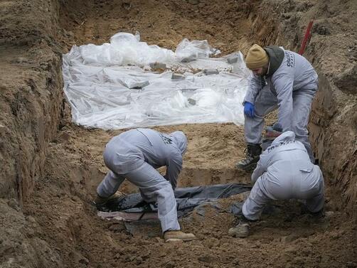 Полицията в Киевска област съобщи че два масови гроба са