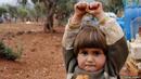 Сирийско дете се "предаде", защото обърка фотоапарата с оръжие
