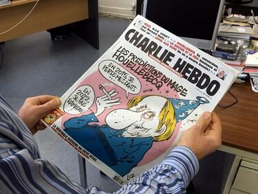 Трагично известният Charlie Hebdo вече на немски