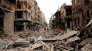 Разрушените от сблъсъци улици в центъра на Алепо